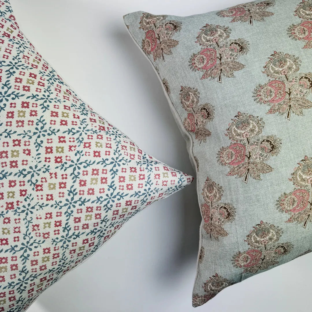 Patterned cushion covers in blue and red colours