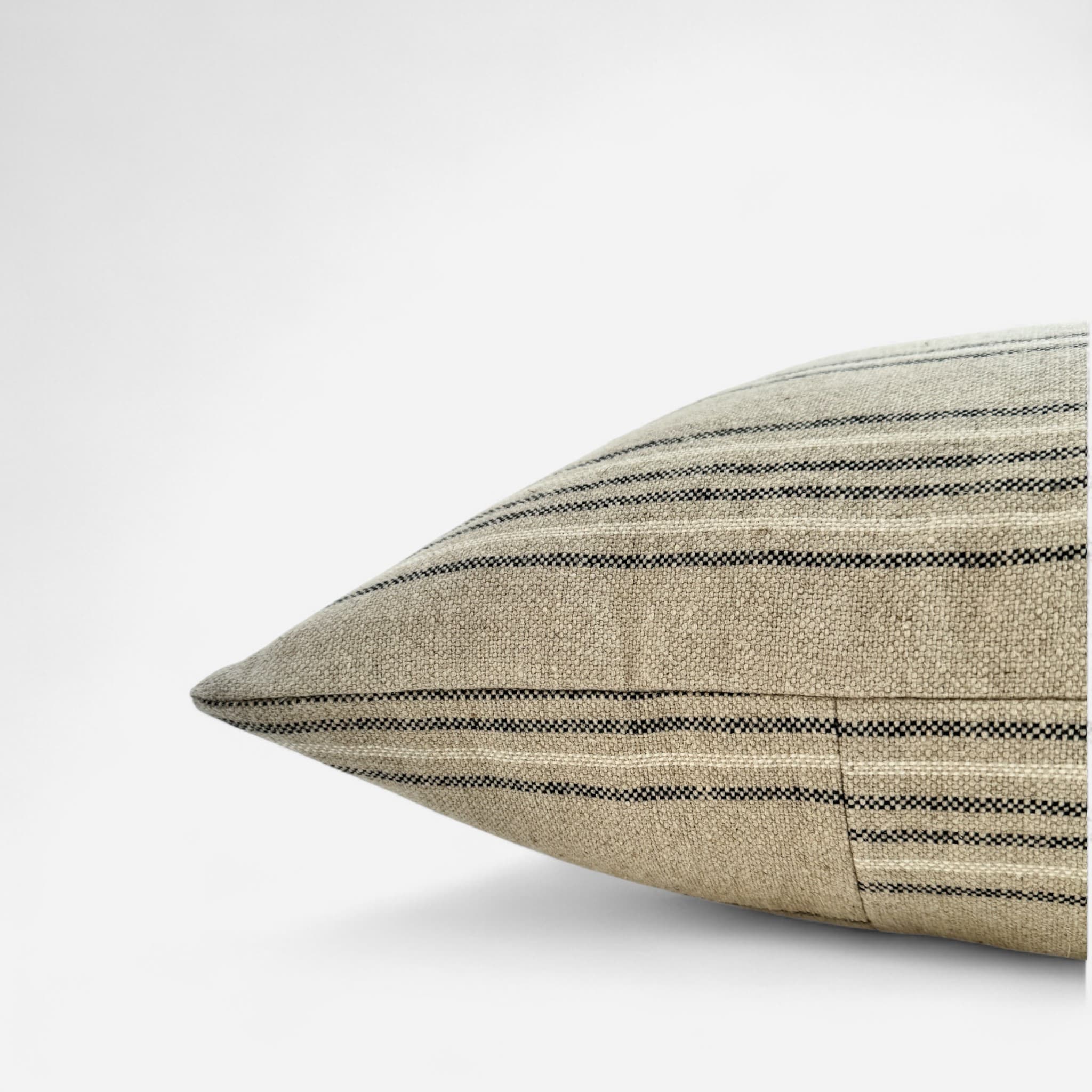 Detail view of rustic linen cushion cover