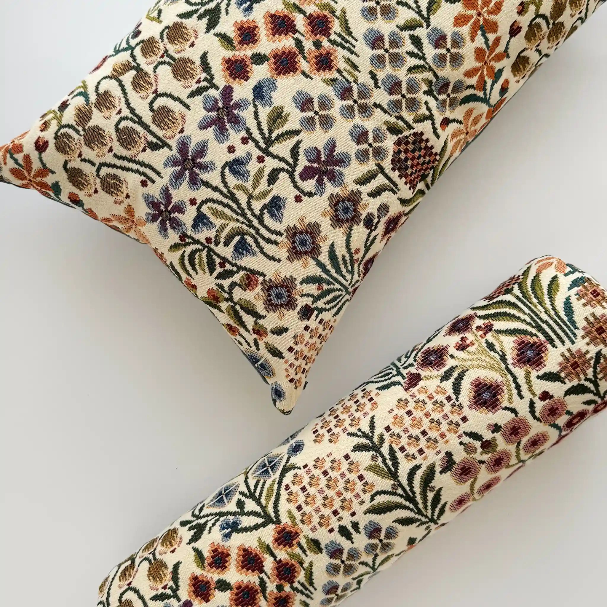 Bolster and lumbar cushions in floral pattern