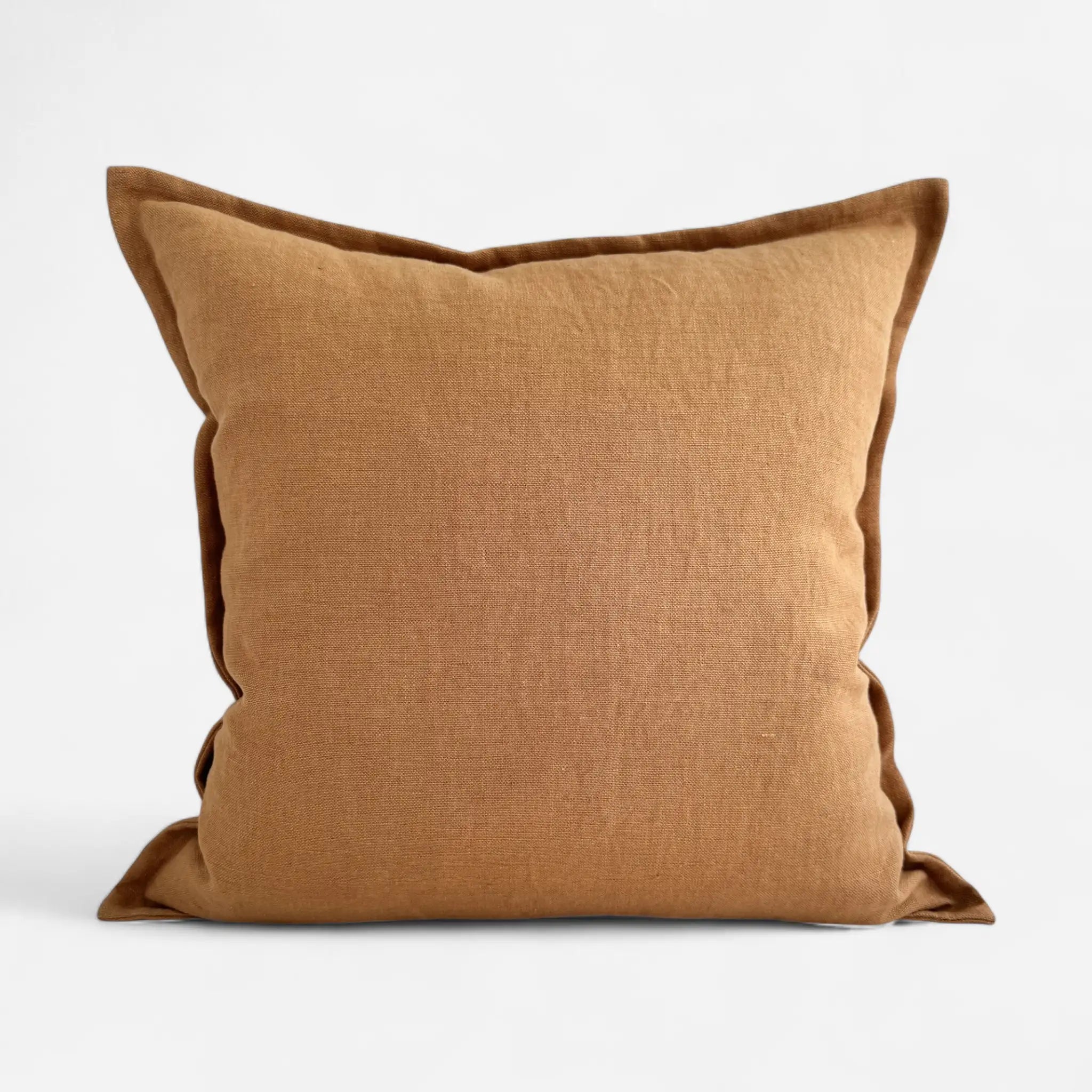 Stonewashed linen cushion cover in caramel