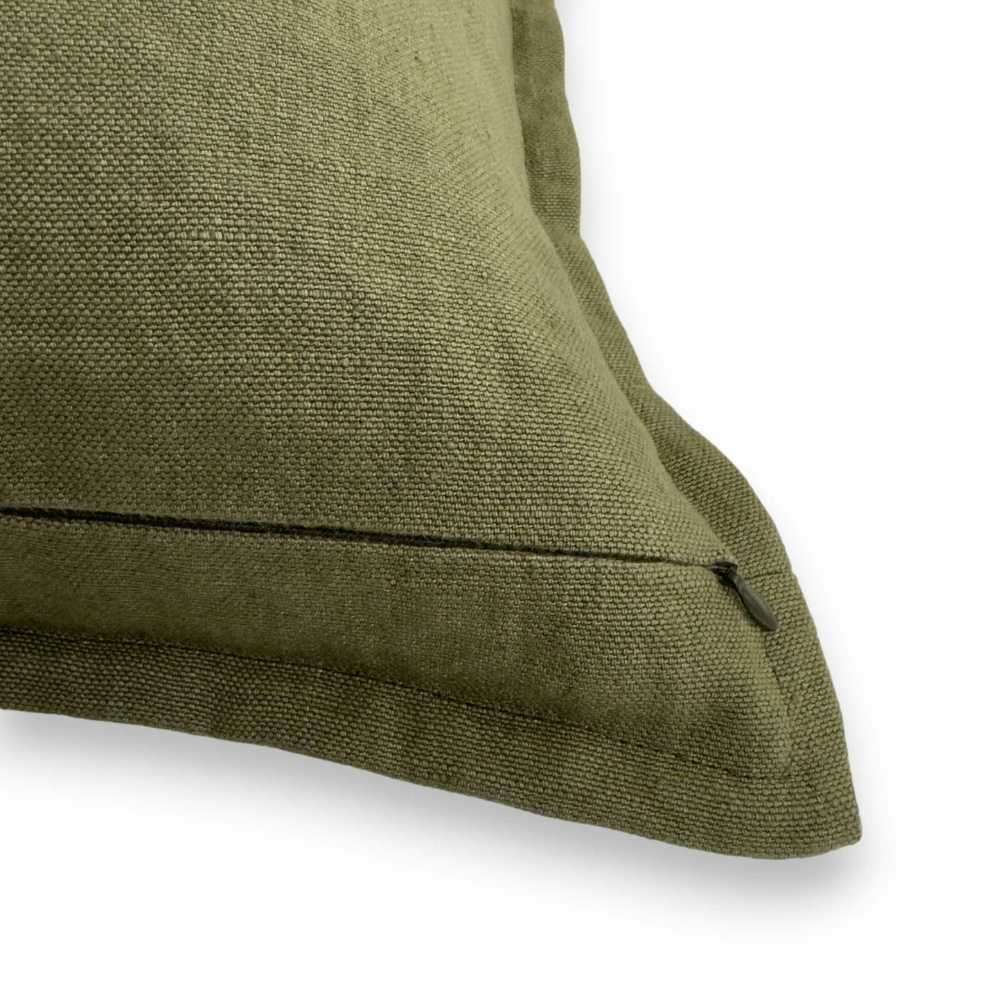 Detail view of olive green linen cushion cover with concealed zipper