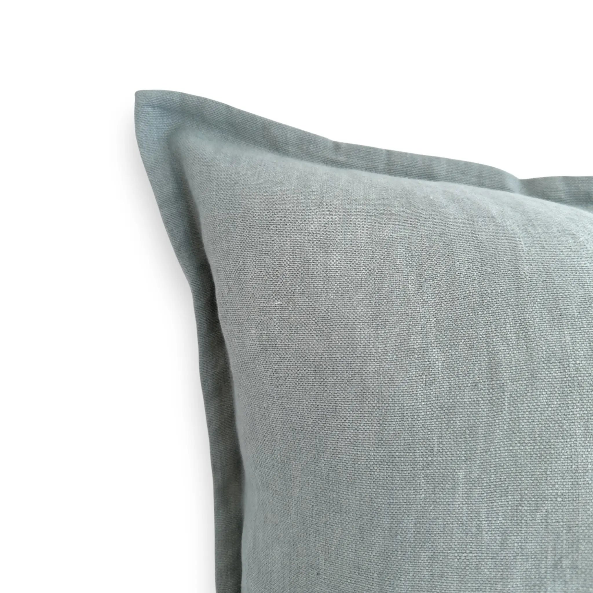 Detail view of duck egg blue linen cushion cover
