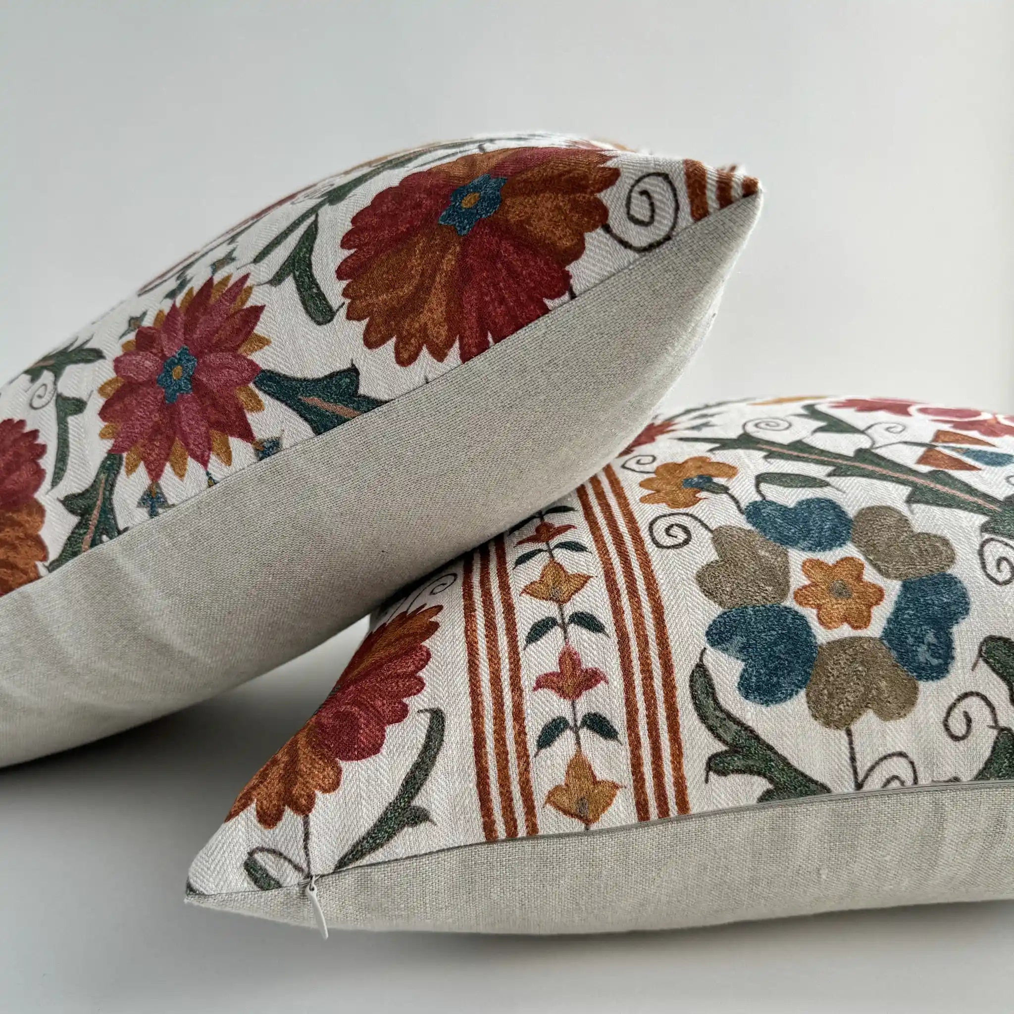 Slow Mornings Suzani linen cushion cover showing floral pattern detail and natural linen texture