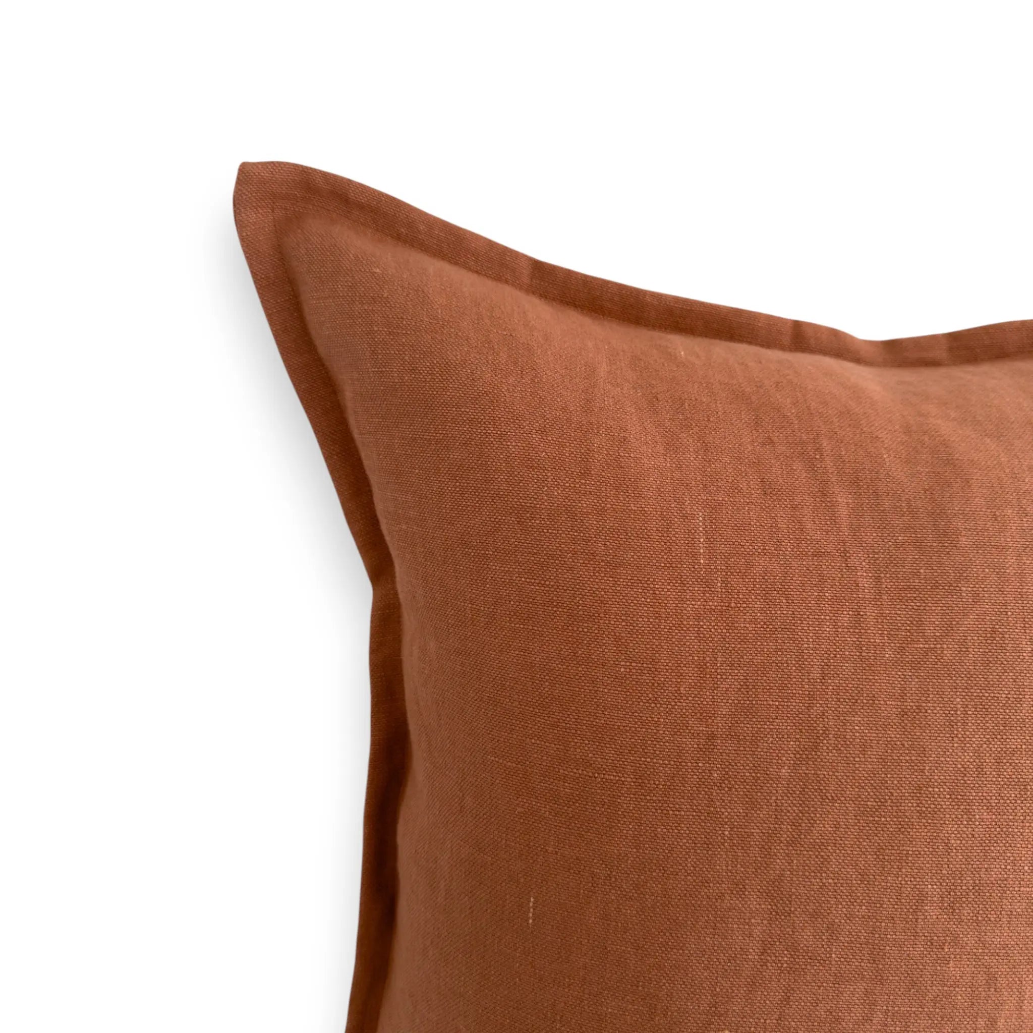 Detail view of terracotta linen cushion cover