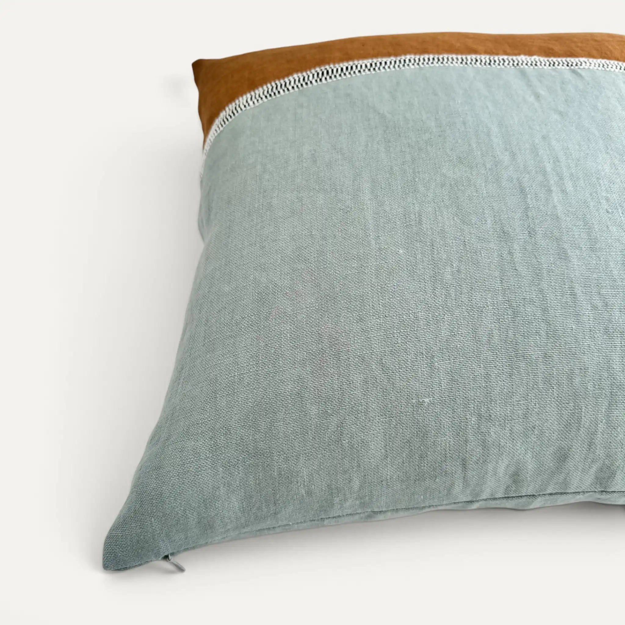 Hidden zipper of linen cushion cover in duck egg colour