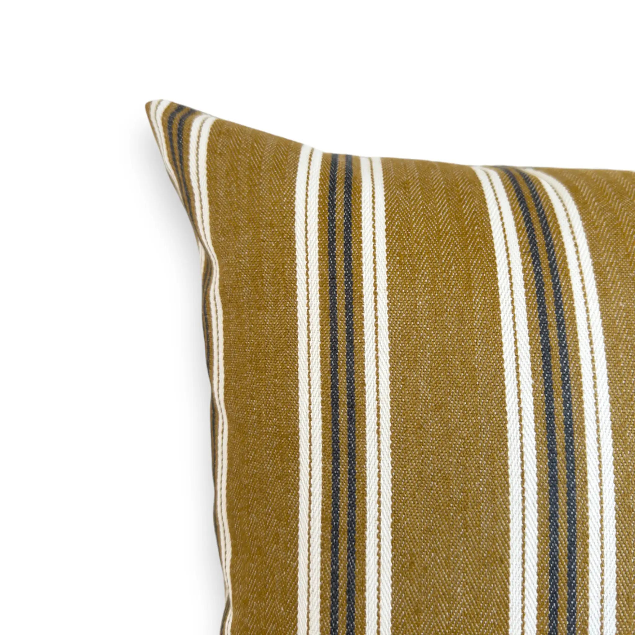 Detail view of mustard striped cushion