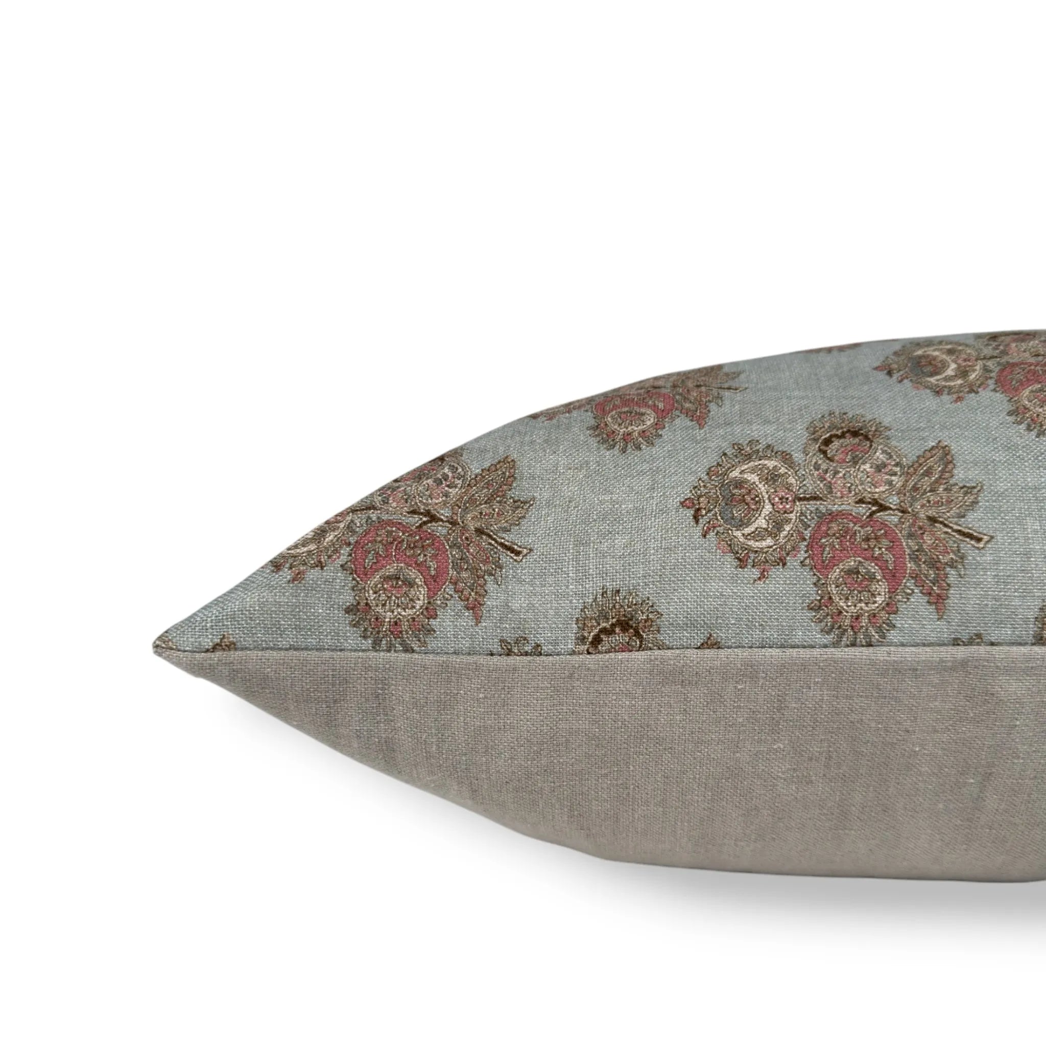 Side view of a duck egg blue patterned cushion cover