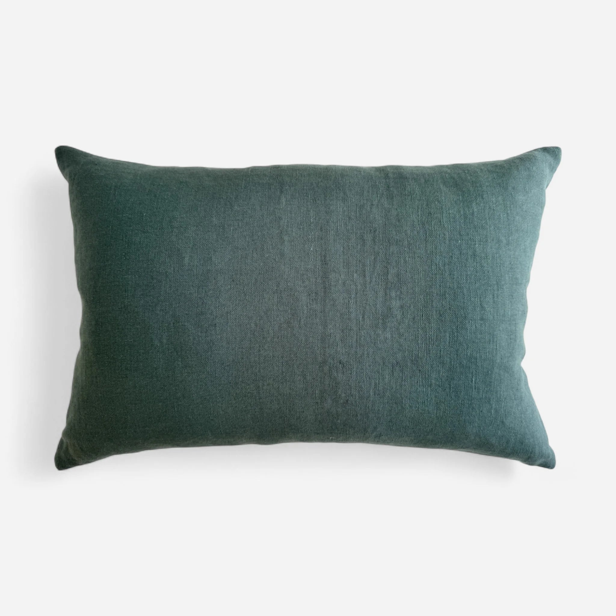 Teal blue reverse side of the cushion