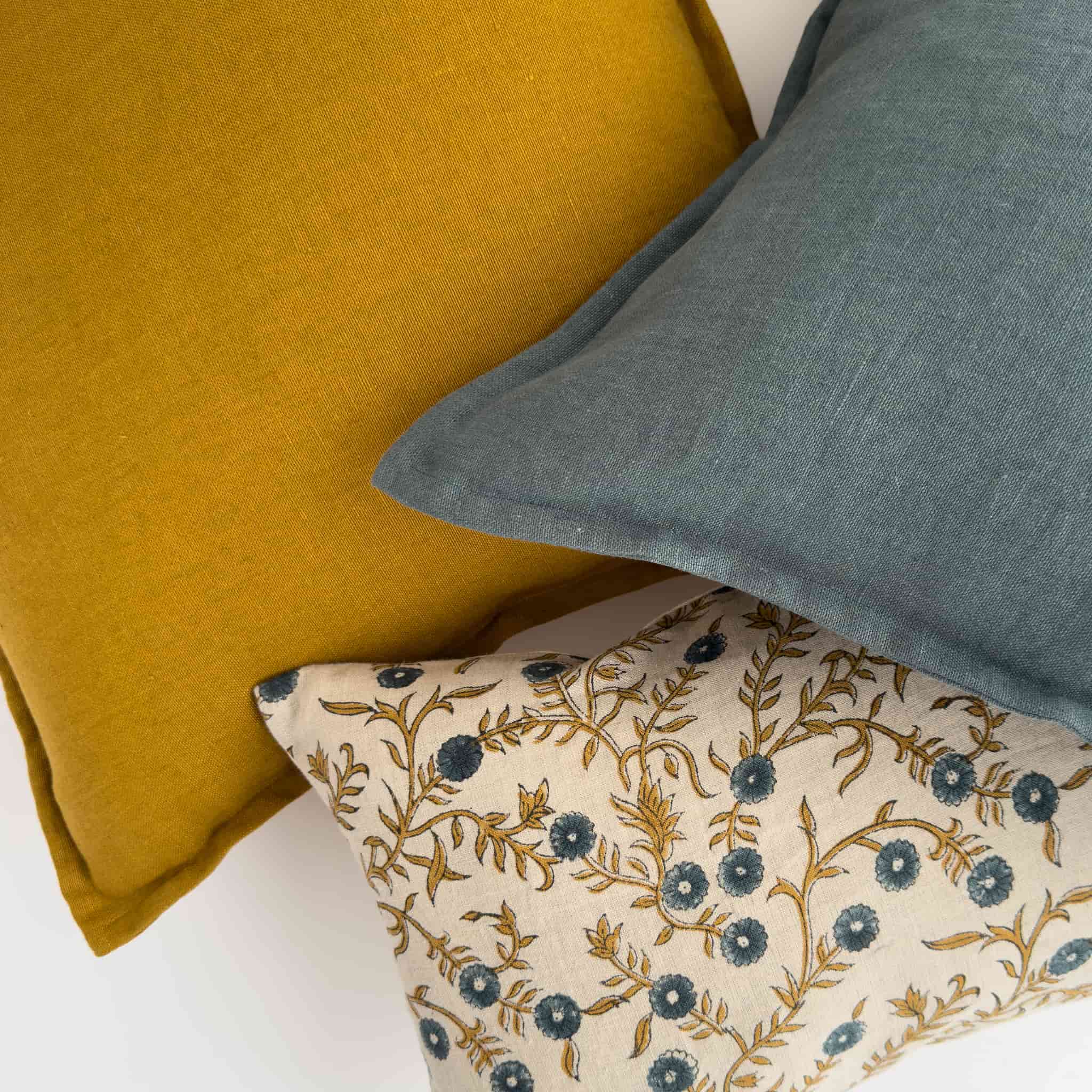 Mustard and teal linen cushions