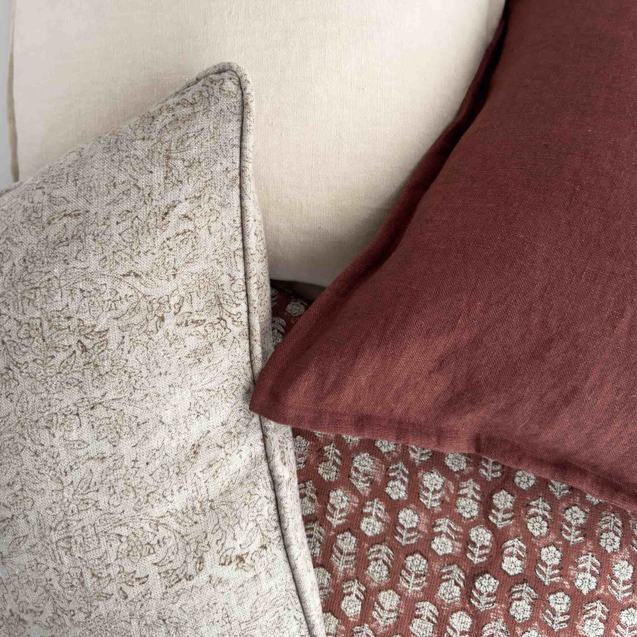 Dark red and cream cushions