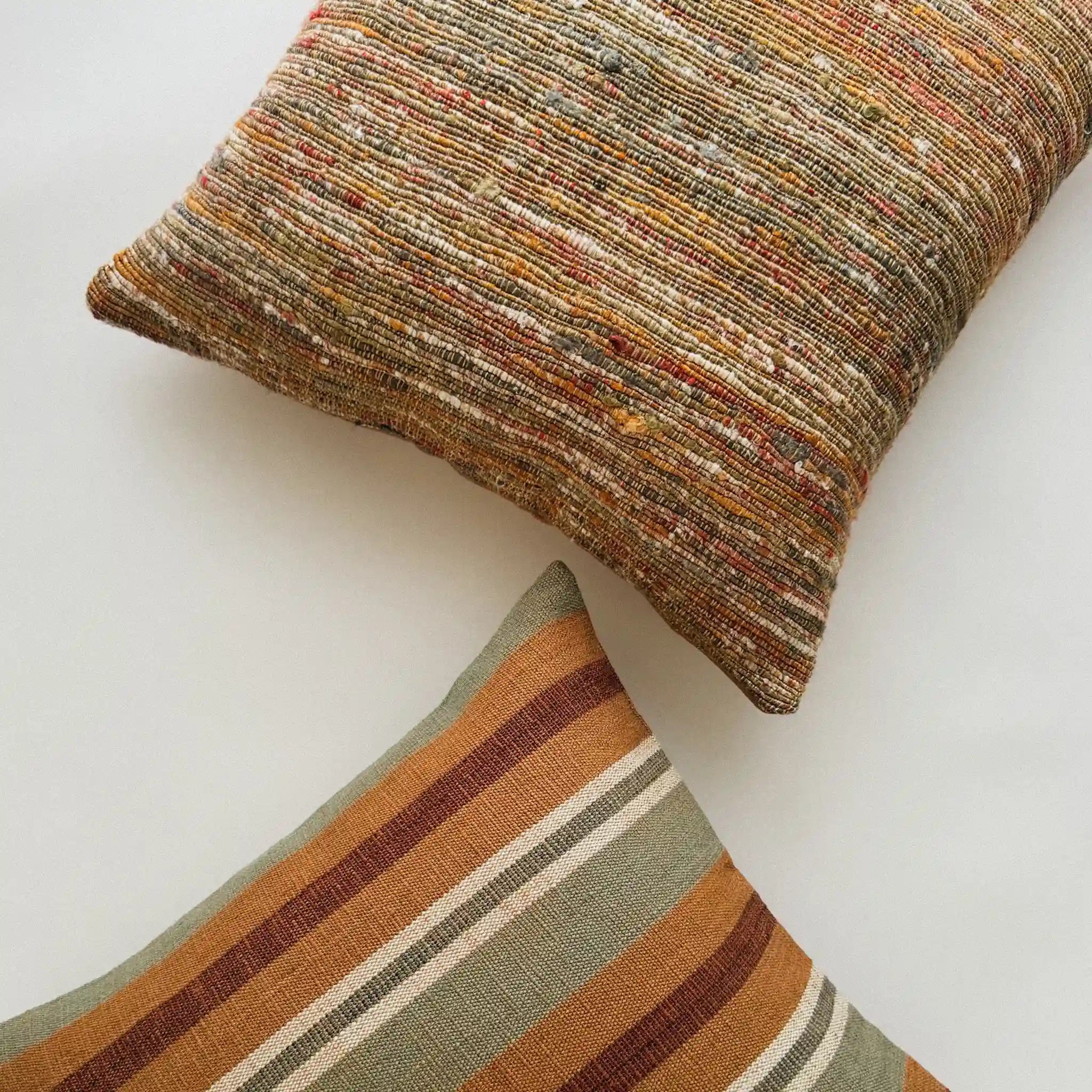 Textured orange and green cushions