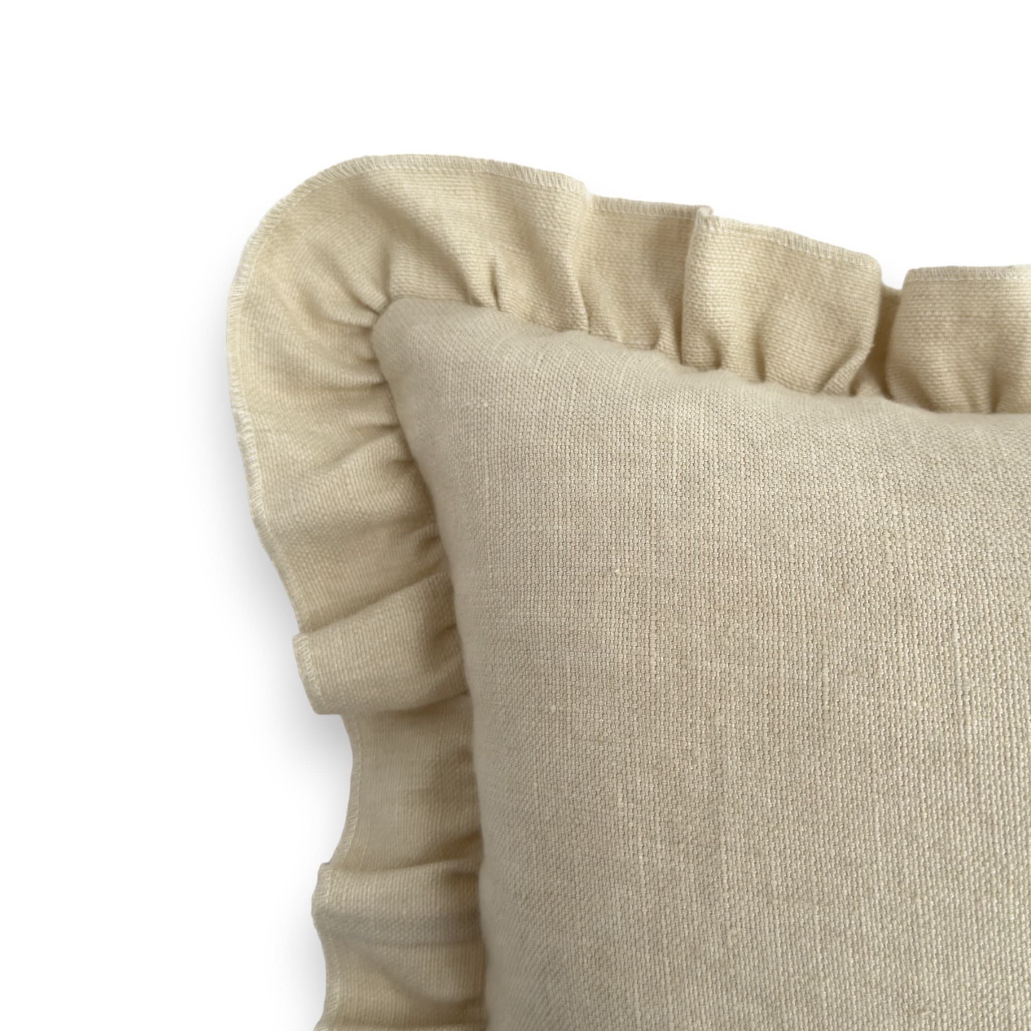 Detail view of cream linen frill cushion cover