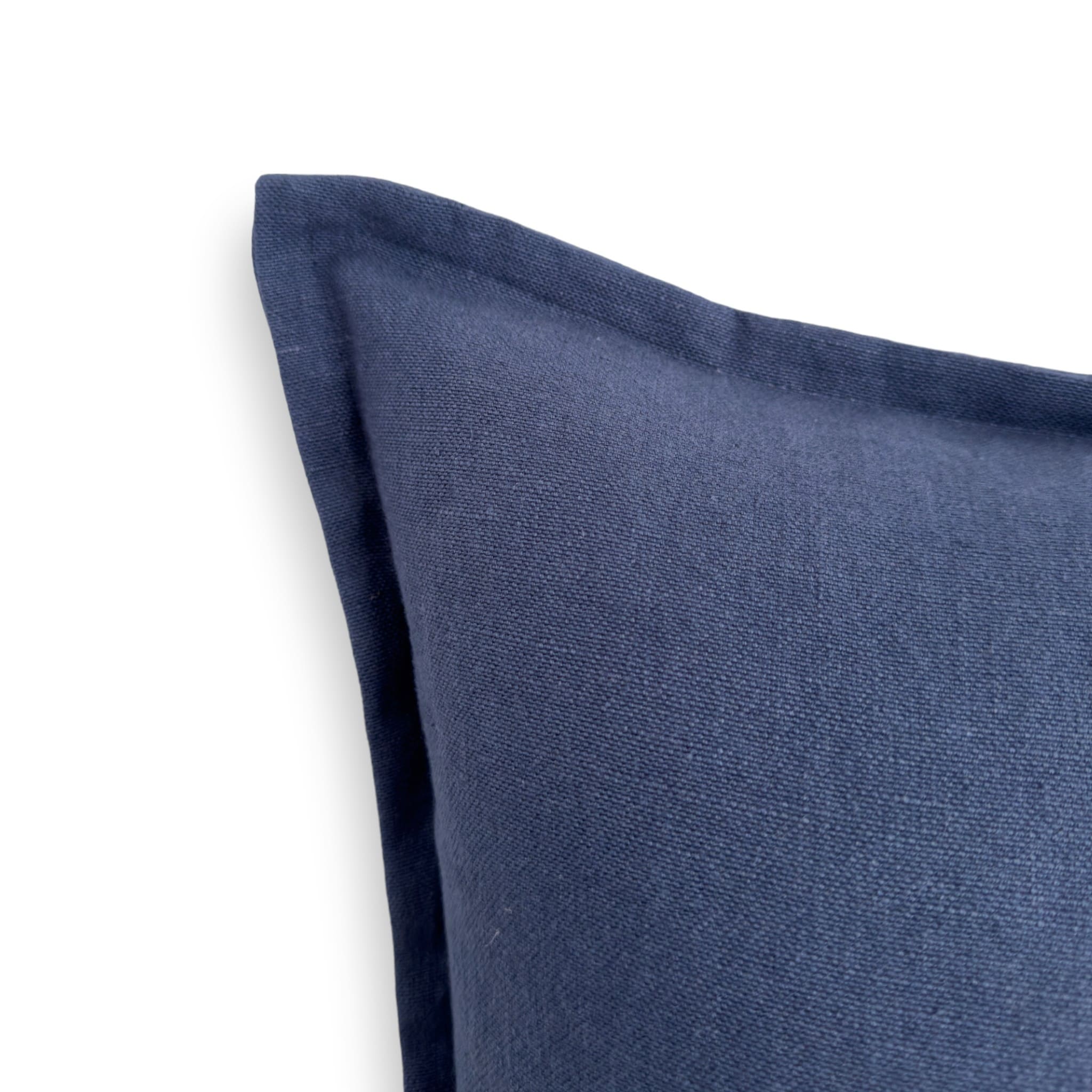 Detail view of navy blue linen cushion cover
