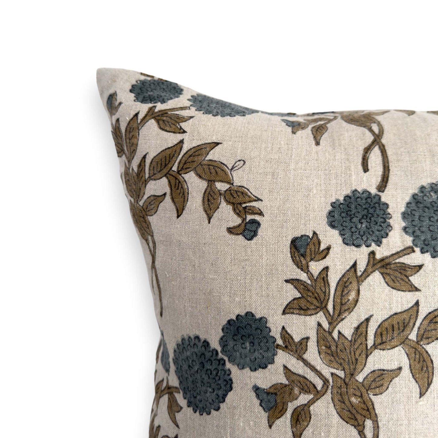 Close up view of blue floral block print cushion cover