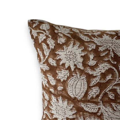 close up view of brown floral block print cushion cover