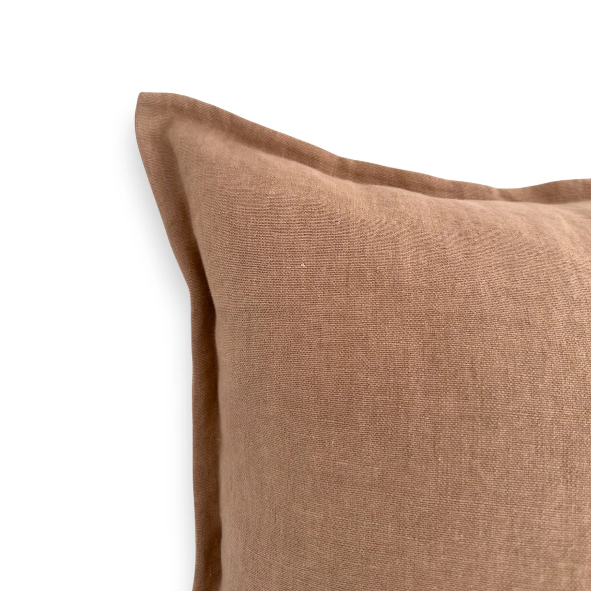 Detail view of clay brown linen cushion cover