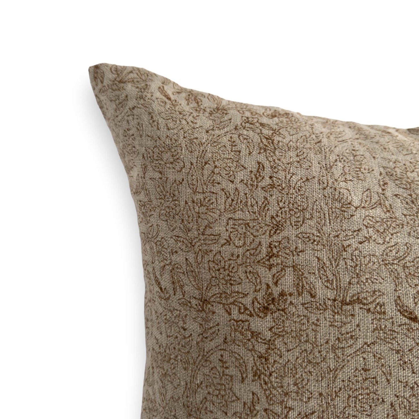 Close up view of brown floral bock print cushion cover