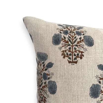 Corner of blue floral linen block print cushion cover