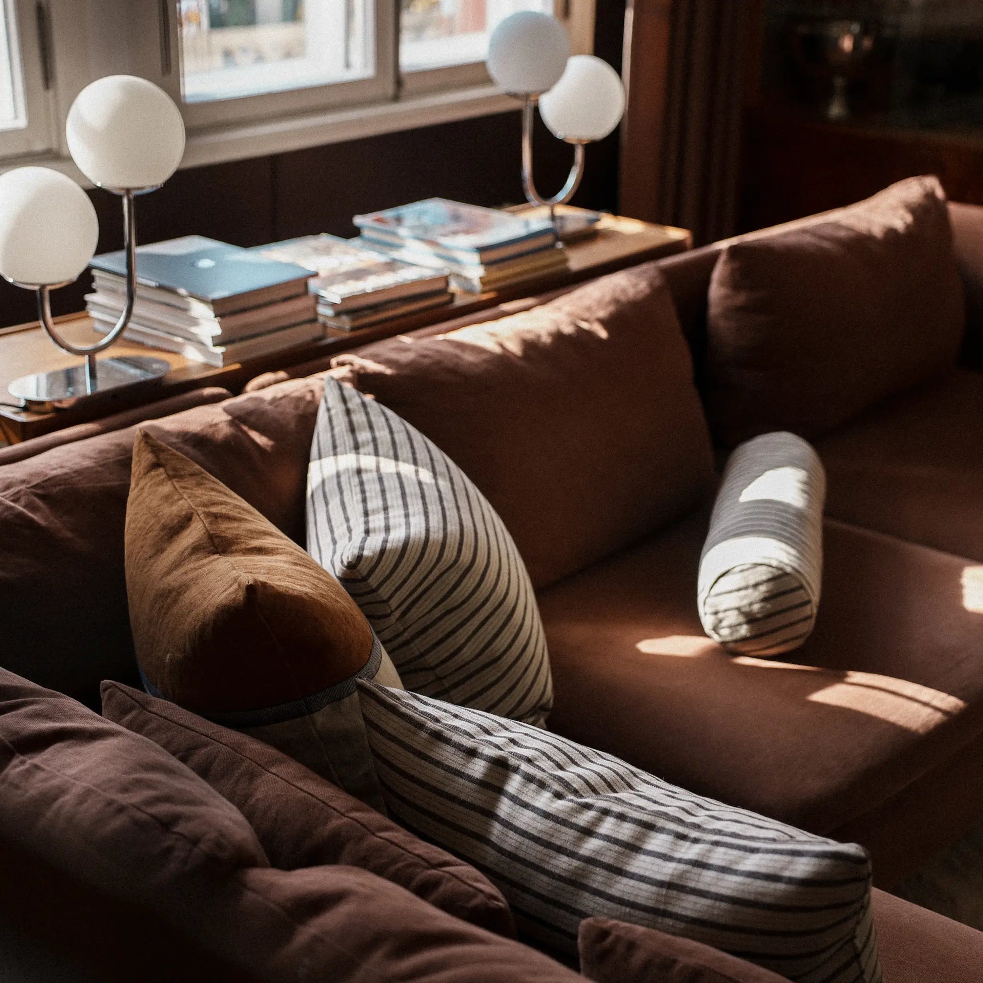 Contemporary sofa styling with neutral cushions