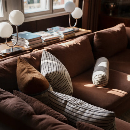 Contemporary sofa styling with neutral cushions