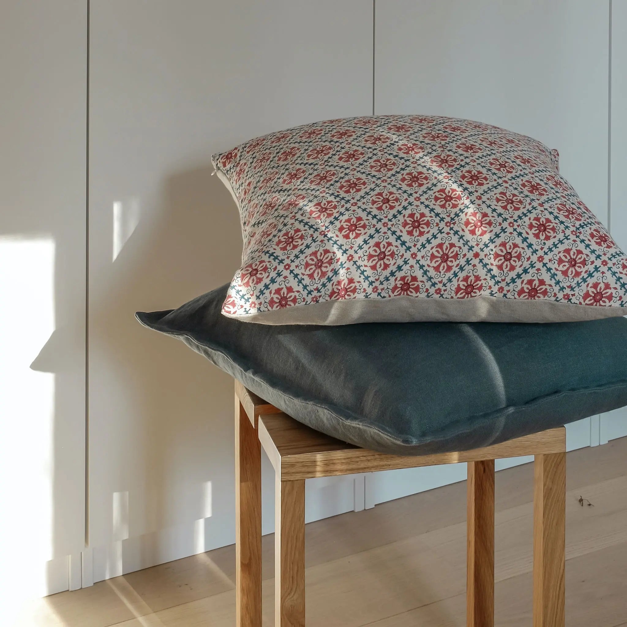 Cushions stacked on a chair