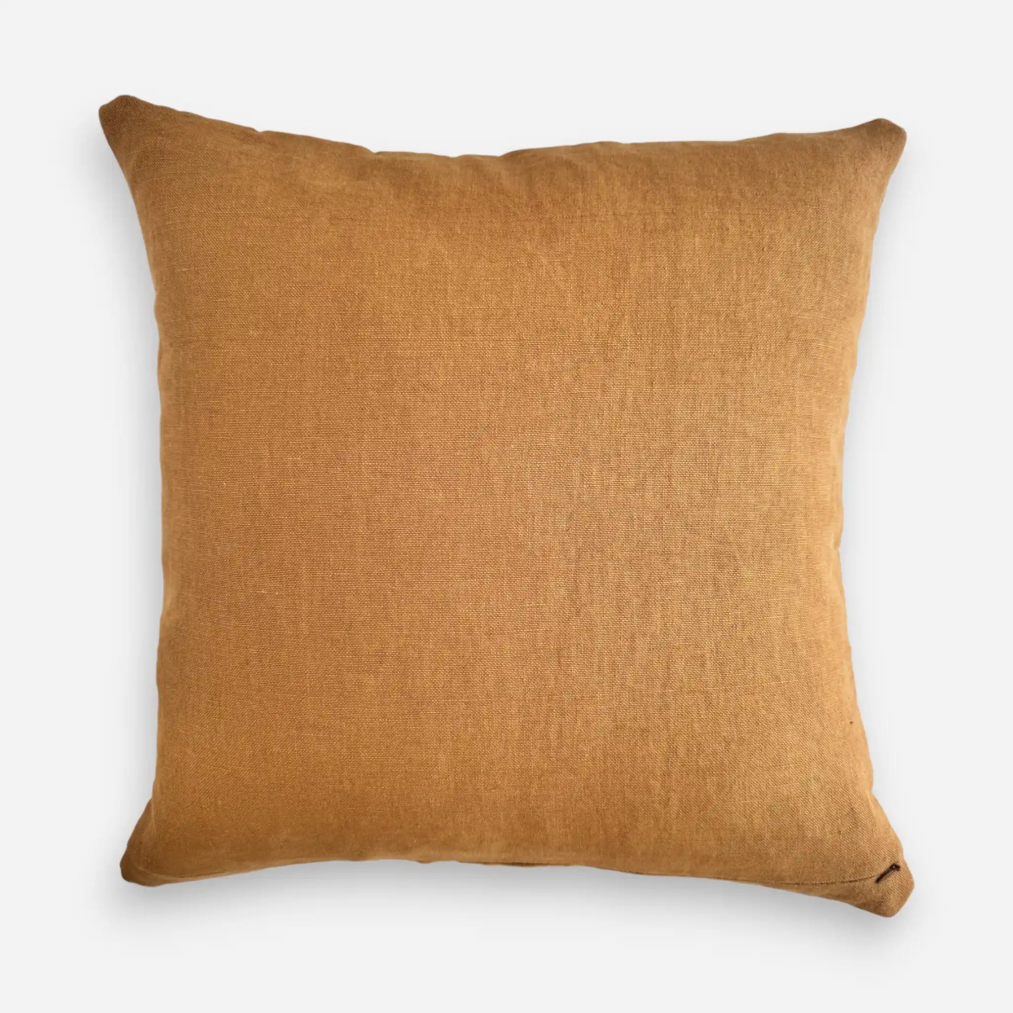 Reverse side of a cushion cover in caramel hue