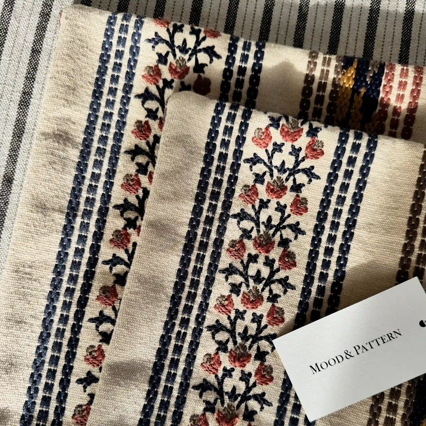 Textile with intricate patterns and a 'Mood & Pattern' tag