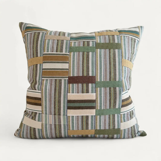 Colourful patchwork cushion cover inspired by Ewe Kente Cloth textiles