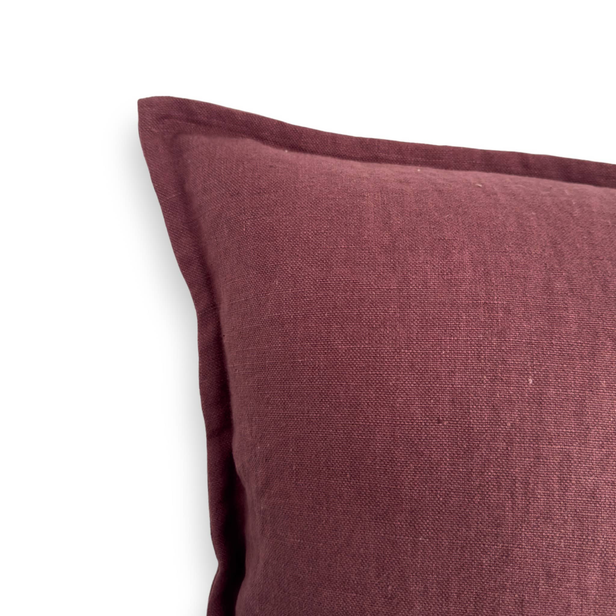 Detail view of mulberry purple linen cushion cover