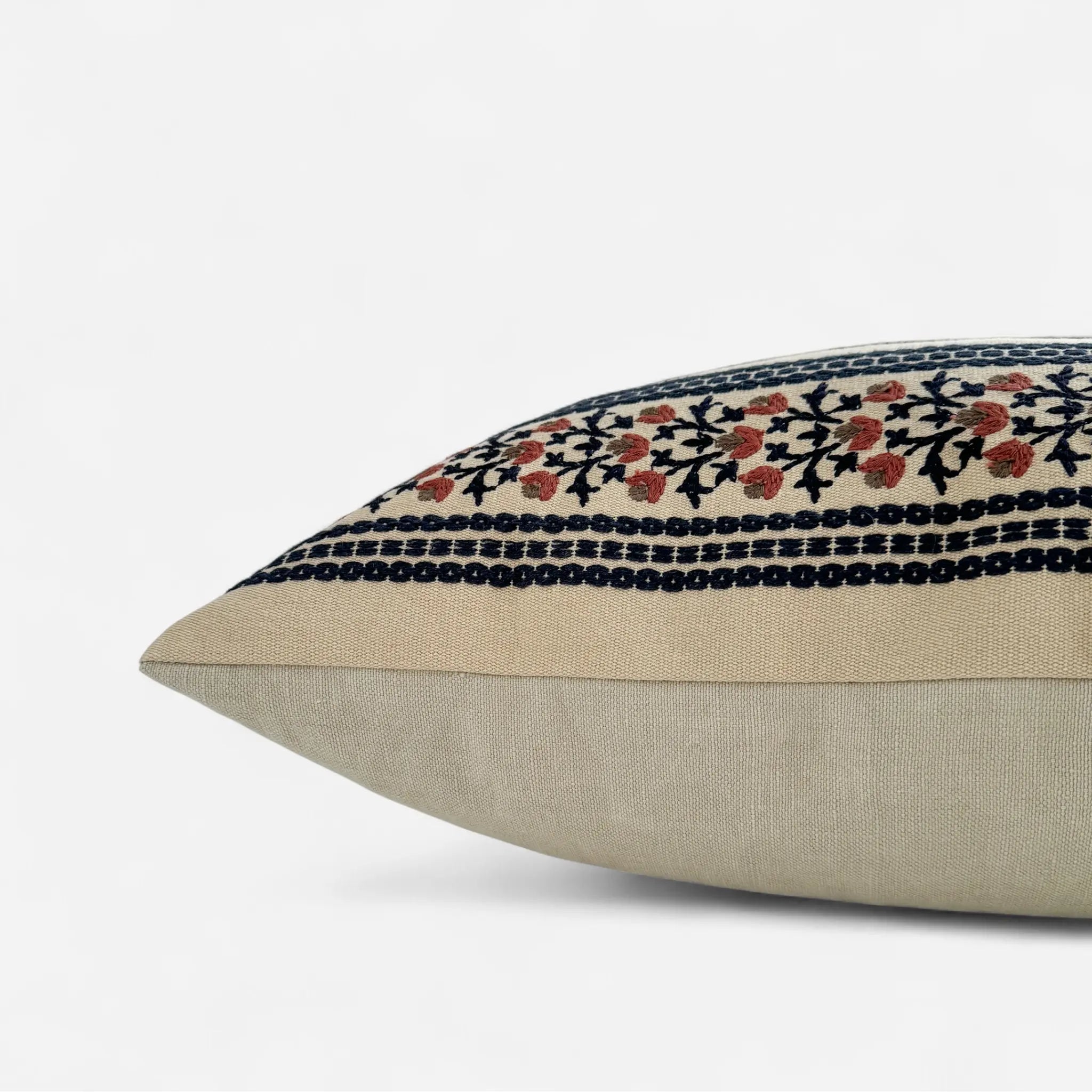 Side view of cushion made with Morris & Co Bloomsbury Stripe fabric