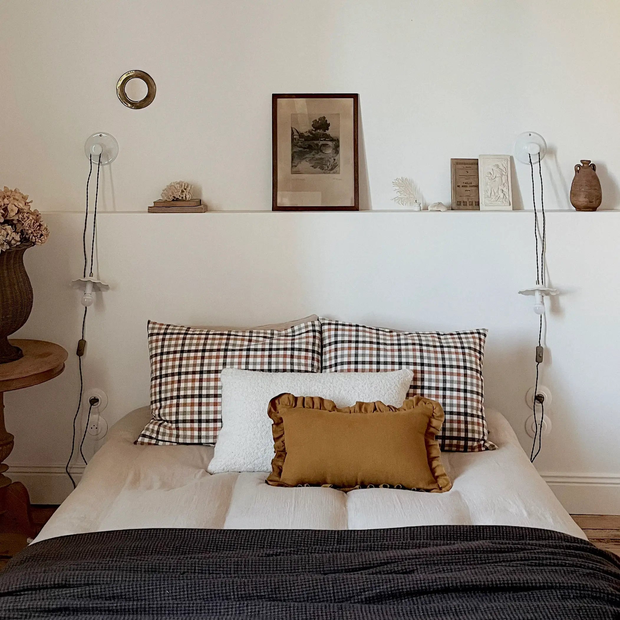 Mustard frill cushion styled on bed